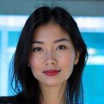 Professional headshot of Maya 'Beatmaster' Chen, Creative Director and Co-Founder